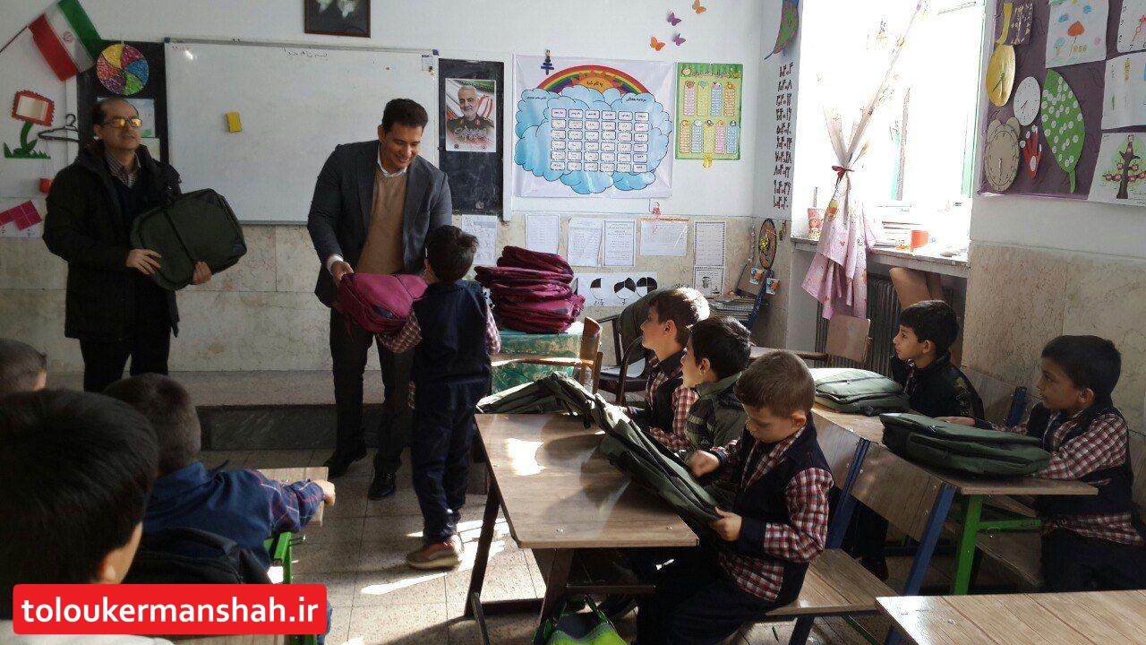 حمایت سرپرستی بانک ملت استان از دانش آموزان کم برخوردار مدارس کرمانشاه+تصویر