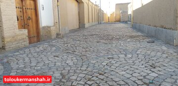 سنگ‌فرش گذر تاریخی فیض‌آباد کرمانشاه رونق دوباره این بافت را رقم می‌زند